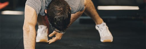 Personal Training 4 man doing push ups at the gym